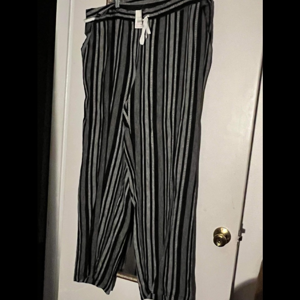 Cato’s black and white striped pants